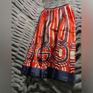 GUCCI
Gg-Print Box-Pleated Silk-Twill Midi Skirt - Red